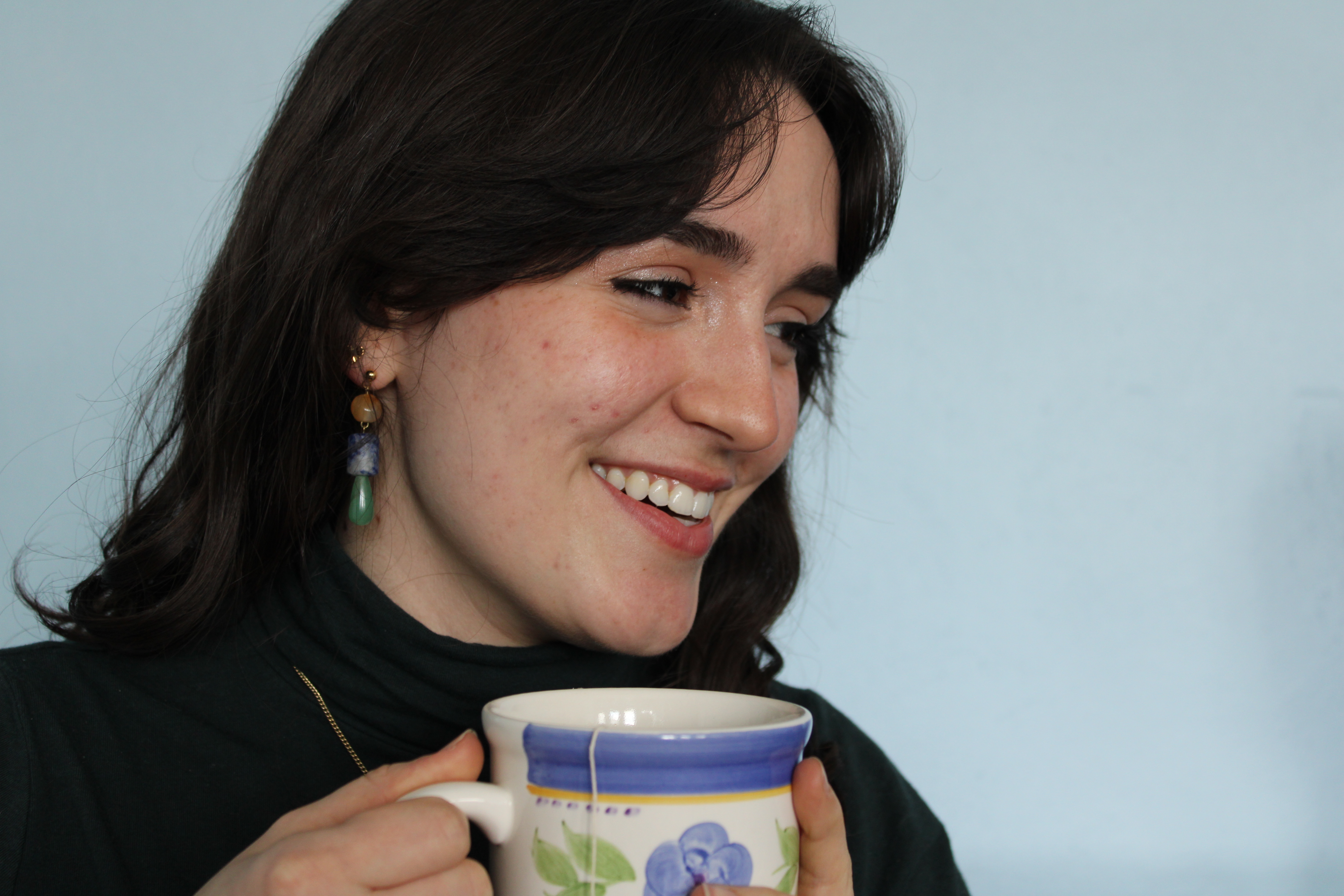 A close up of a girl smiling