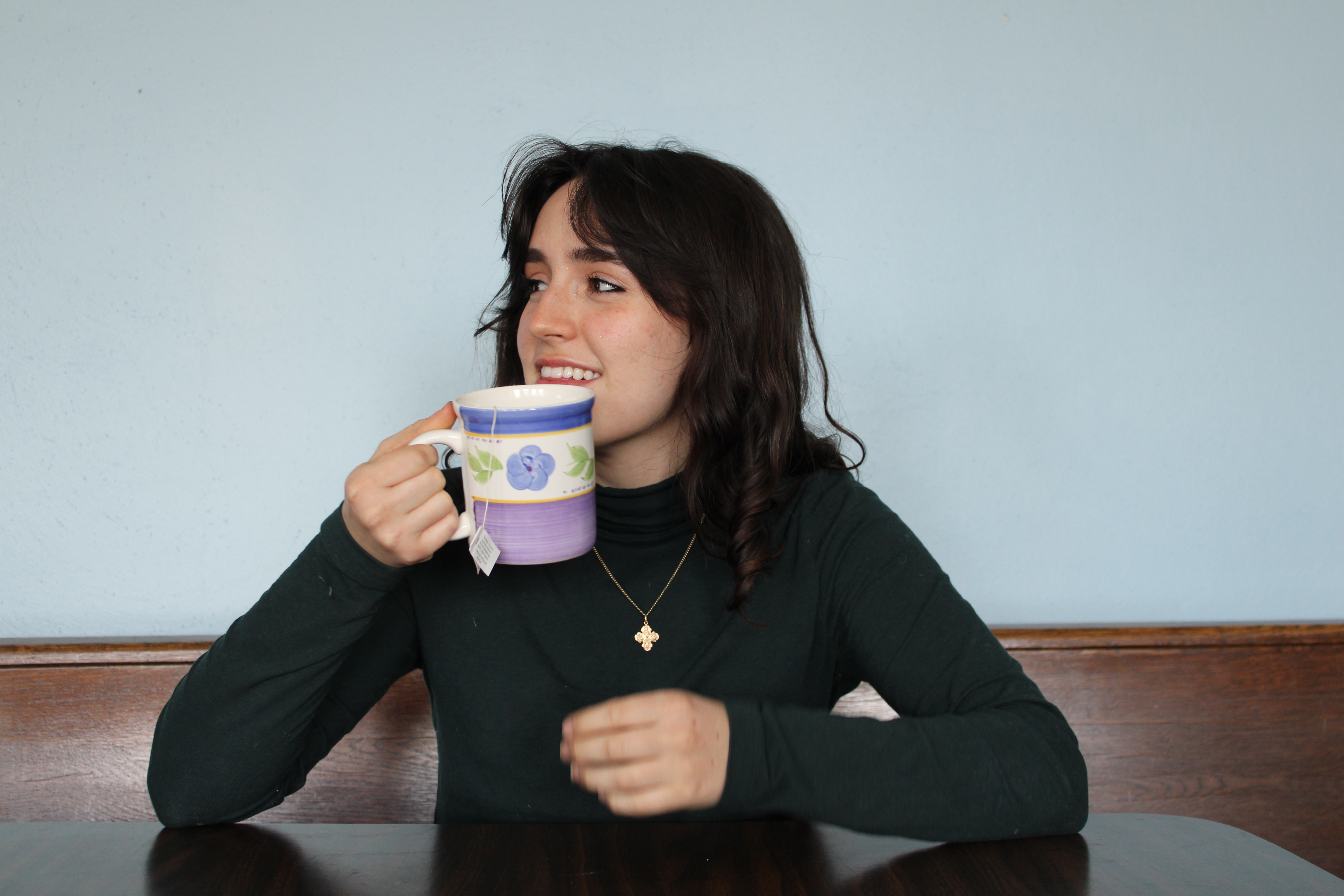 A wide shot of a girl smiling